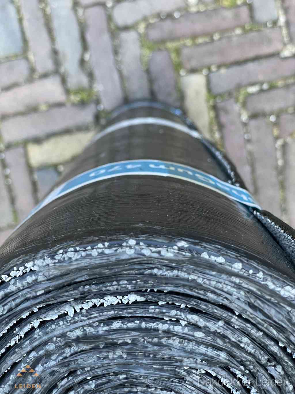 Rol bitumen dakleer met leislag voor plat dak in Leiden Rol bitumen dakleer met leislag voor plat dak in Leiden